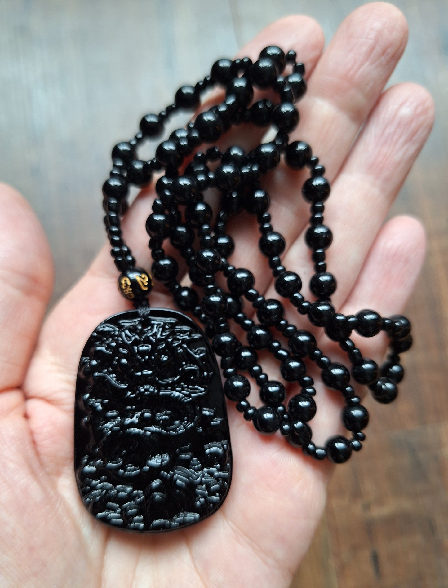 Black glass necklace with Dragon pendant
