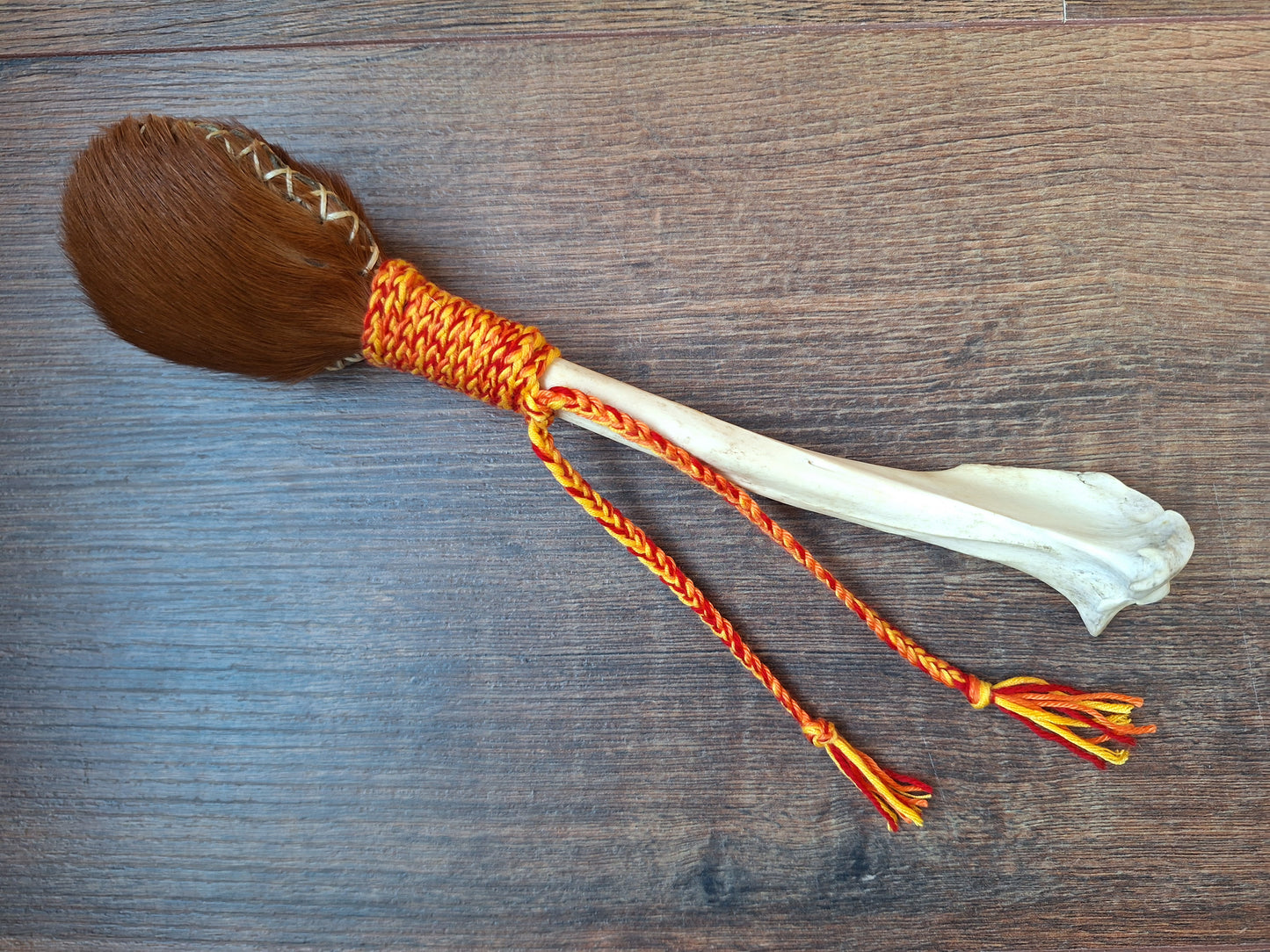 Horse hide and red deer leg bone rattle