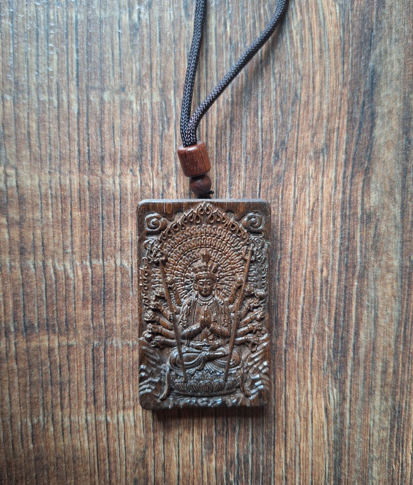 Necklace with wooden pendant Avalokiteshvara