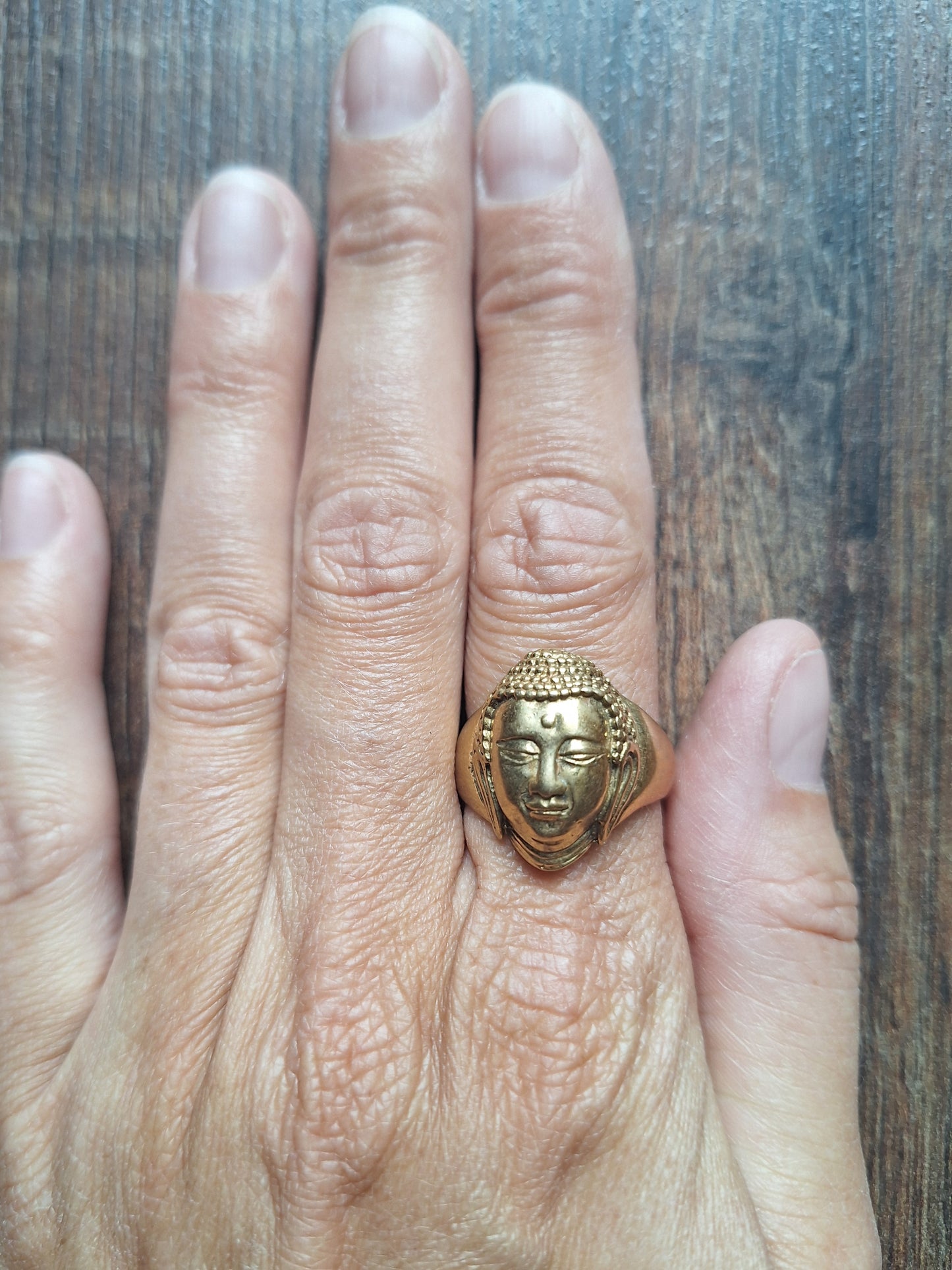 Brass ring Buddha