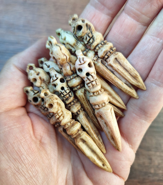 Vintage bone carved phurba pendant