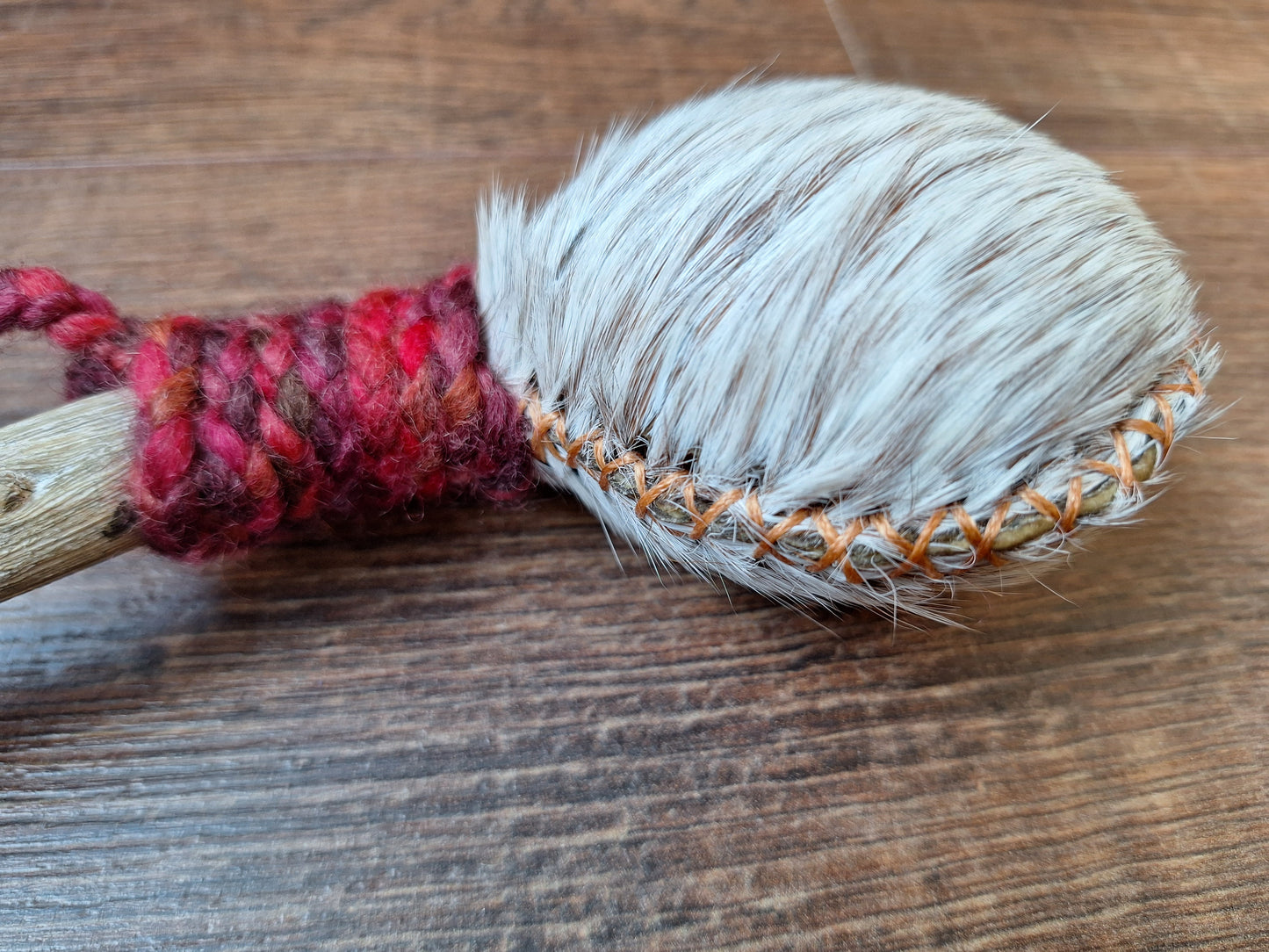 Horse hide and driftwood rattle