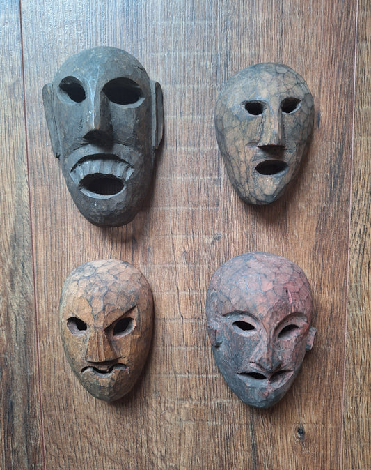Vintage small wooden spirit masks
