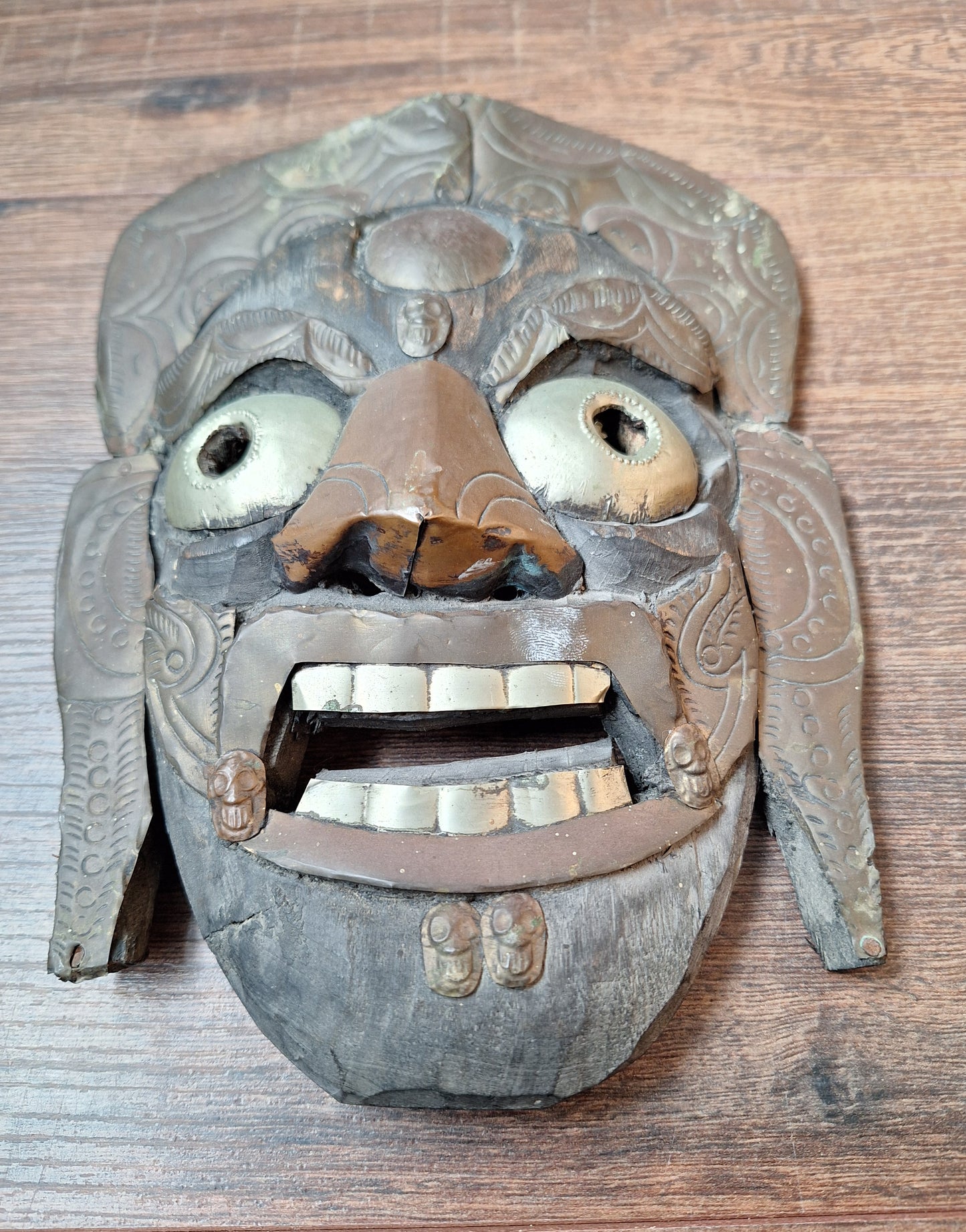 Old wooden Mahakala mask with metal plating