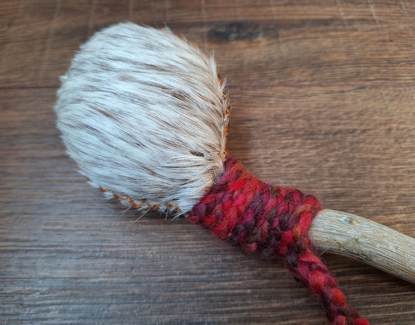 Horse hide and driftwood rattle