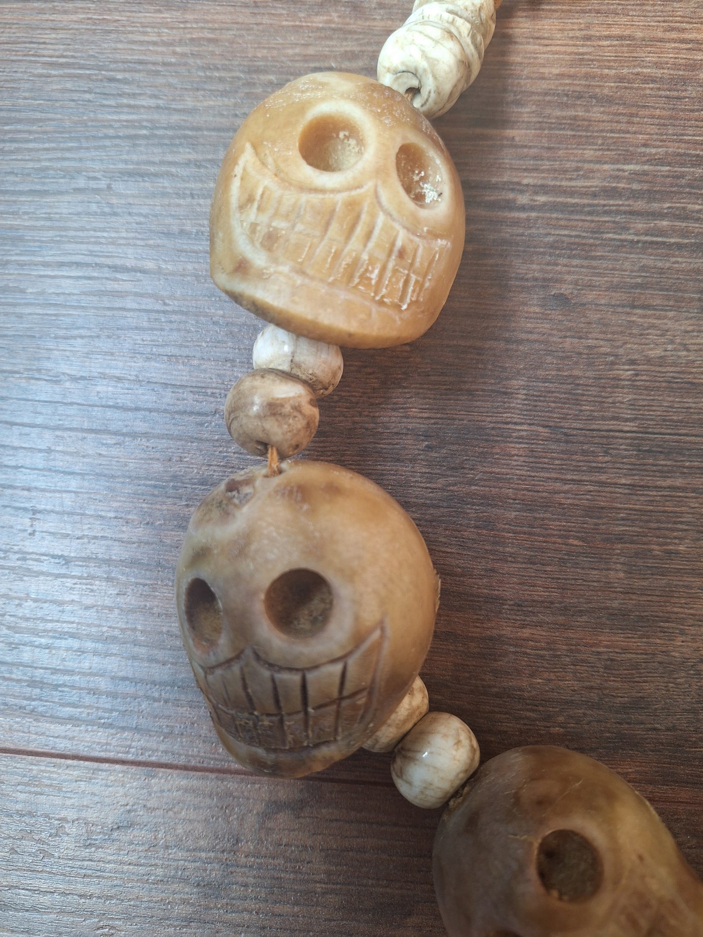 Vintage bone carved skull necklace