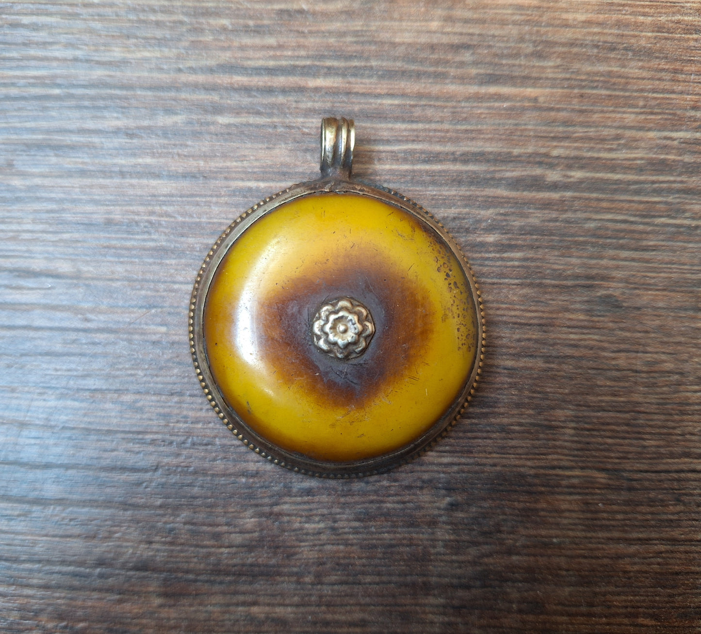 Vintage Tibetan silver and copal pendant