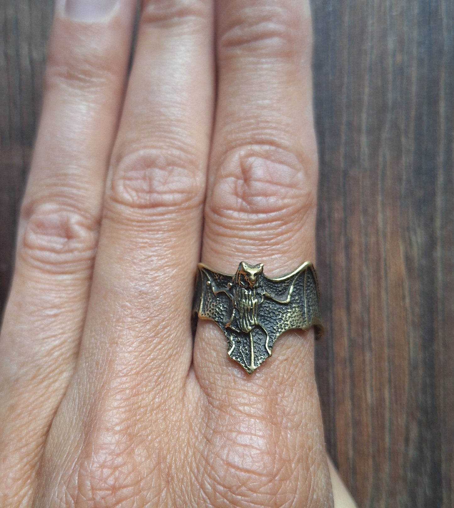 Brass ring Bat