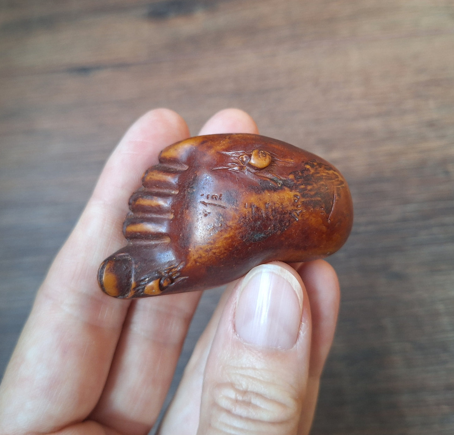 Resin netsuke pendant foot with spiders