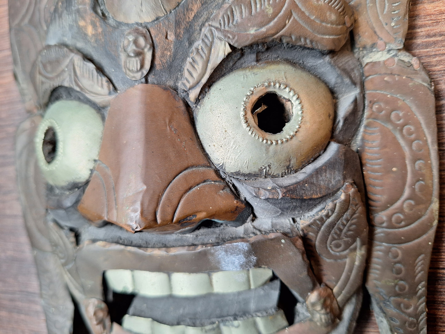 Old wooden Mahakala mask with metal plating