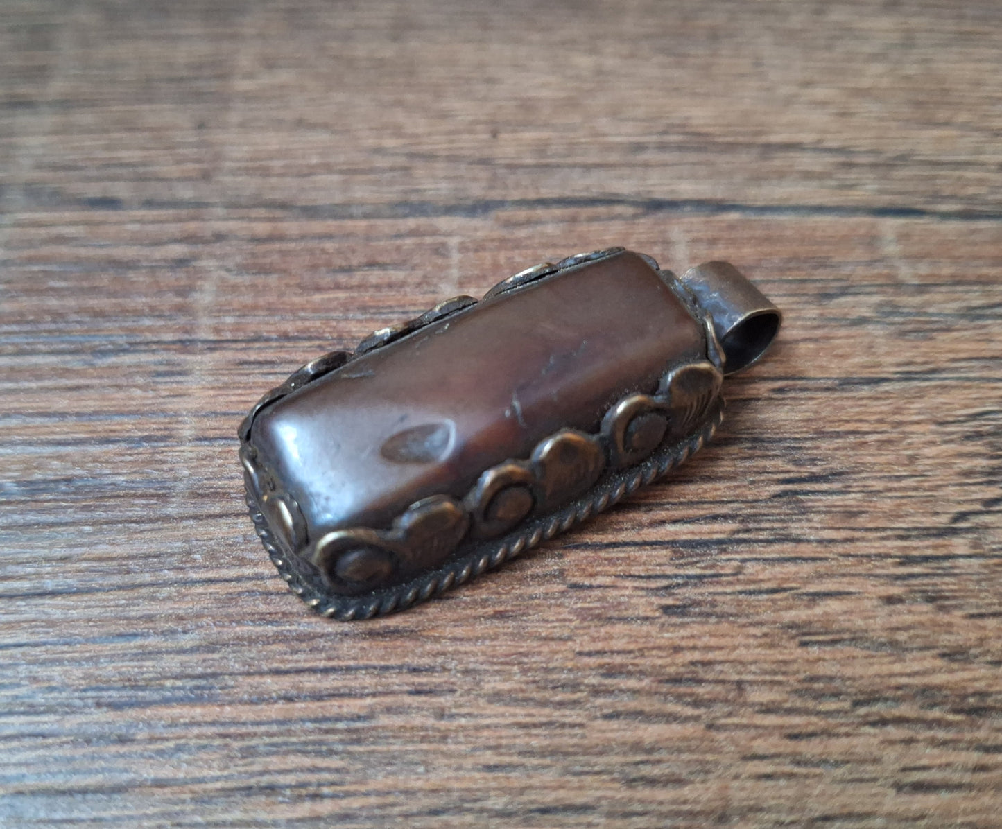 Vintage Tibetan silver and amber pendant