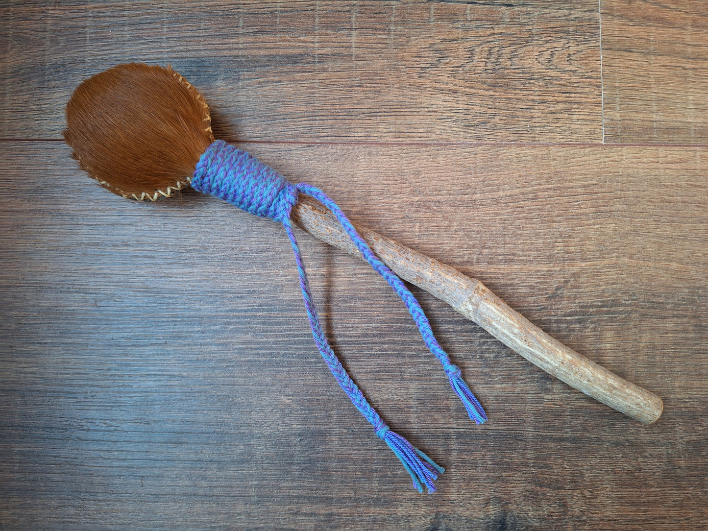 Horse hide and elder wood rattle