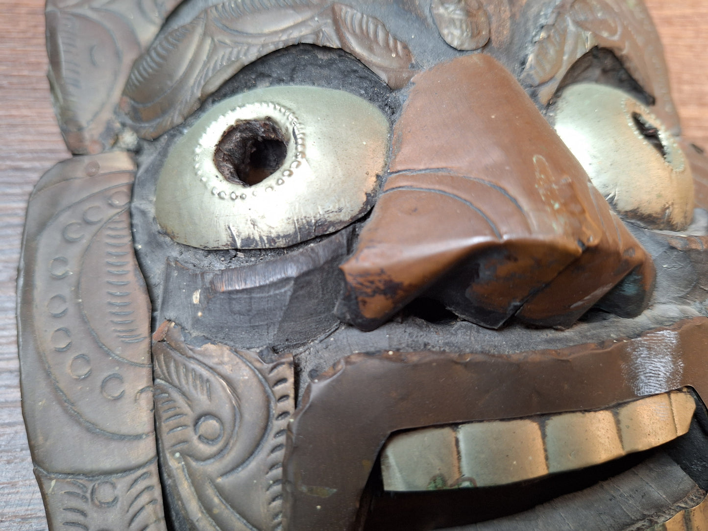 Old wooden Mahakala mask with metal plating