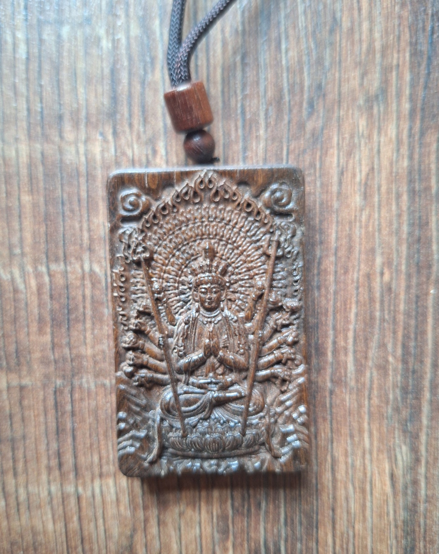 Necklace with wooden pendant Avalokiteshvara