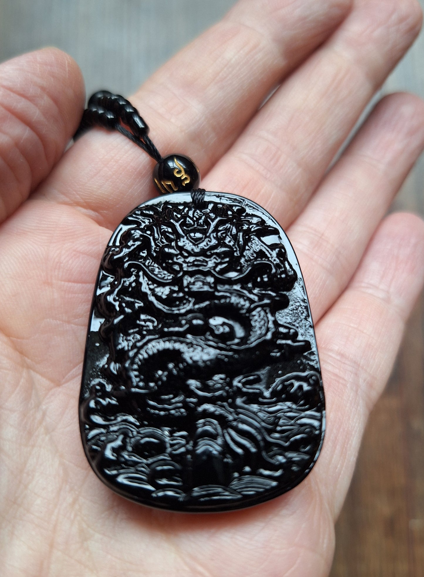 Black glass necklace with Dragon pendant
