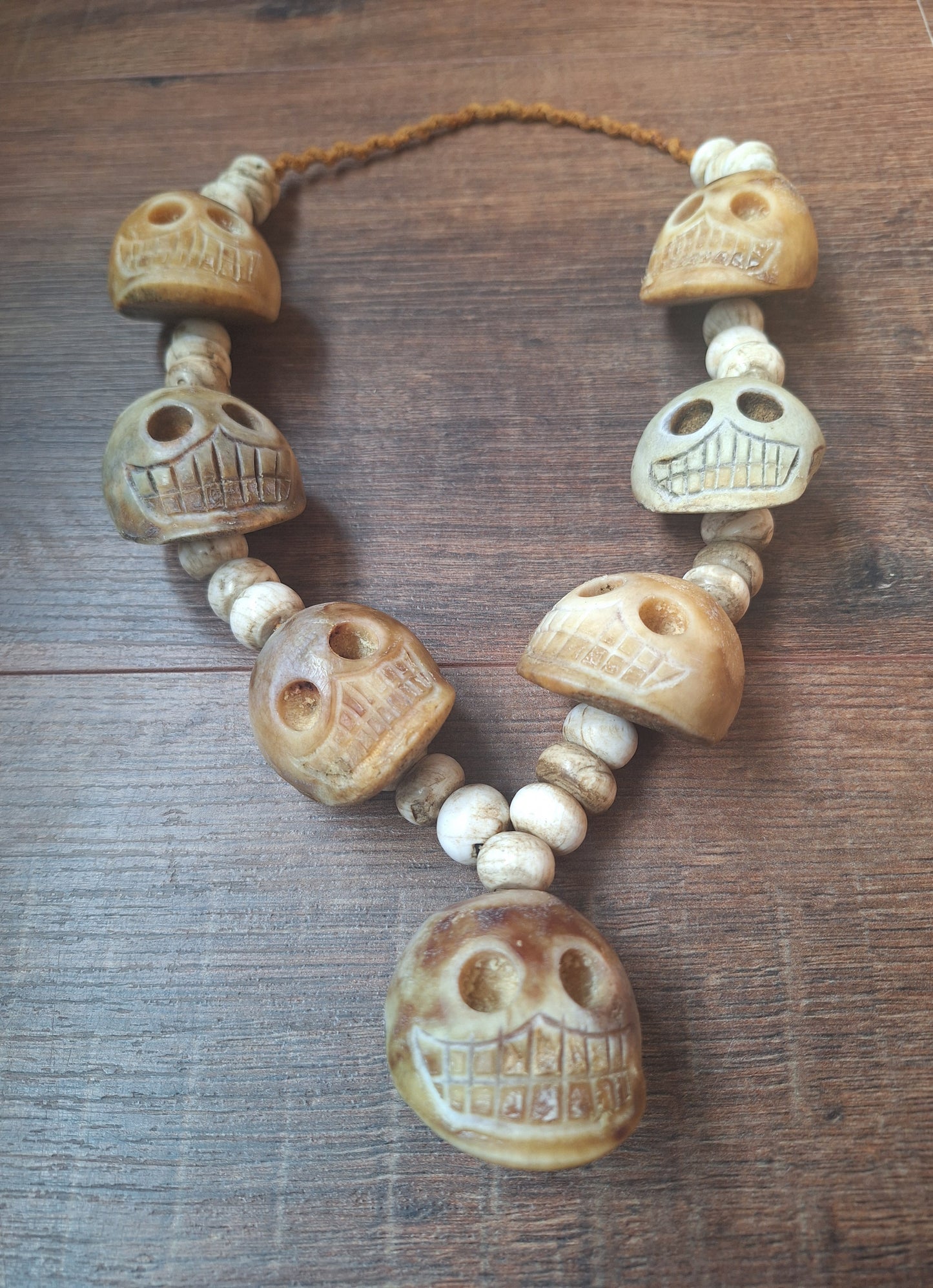 Vintage bone carved skull necklace