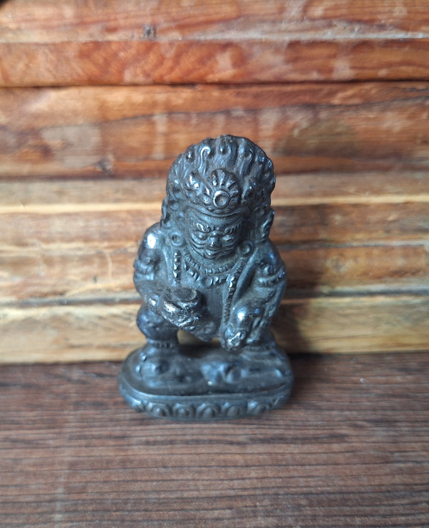 Vintage cast iron Black Dzambala figurine