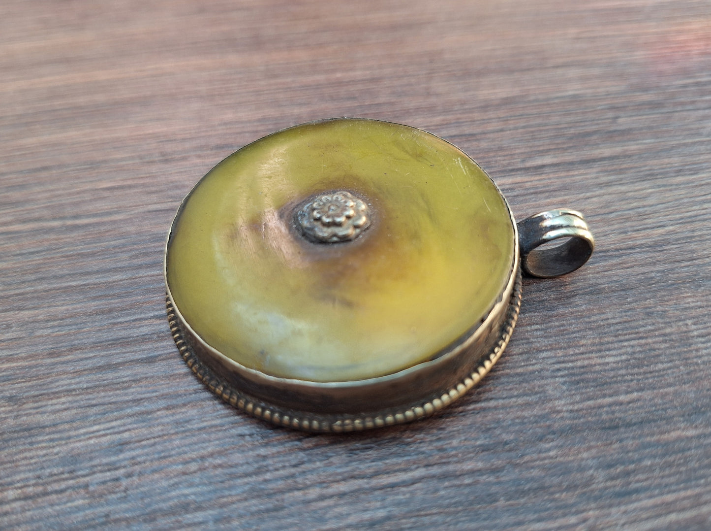 Vintage Tibetan silver and copal pendant