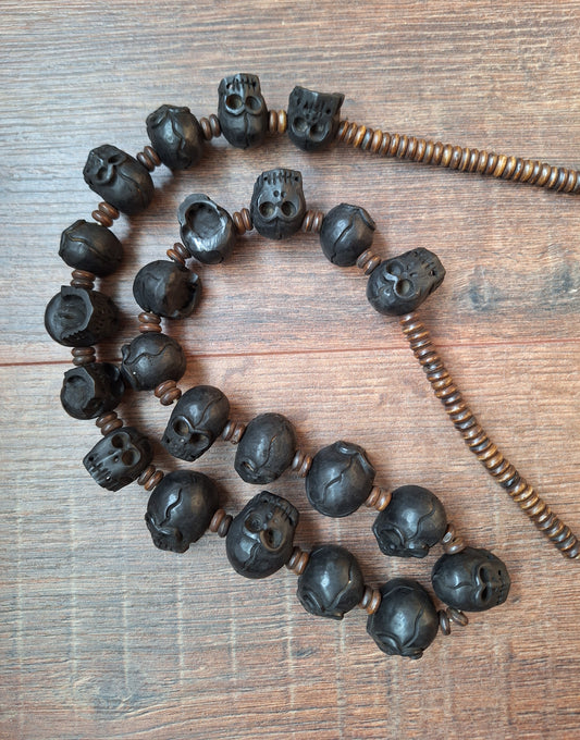 Horn carved skull bead necklace