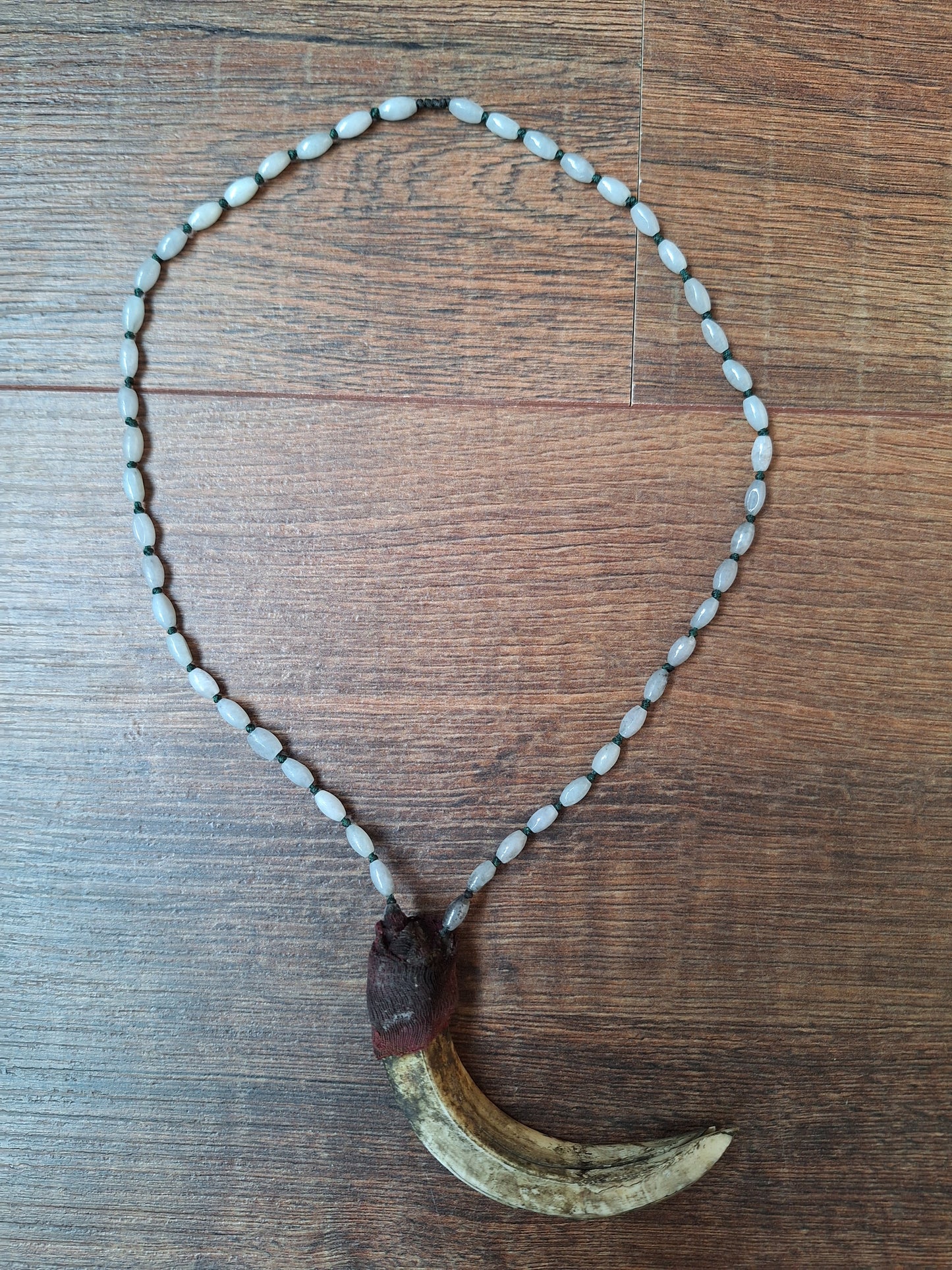Vintage Nepalese snow quartz necklace with wild boar tooth pendant