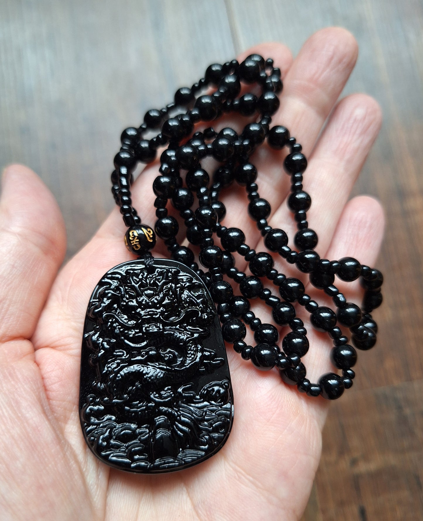 Black glass necklace with Dragon pendant