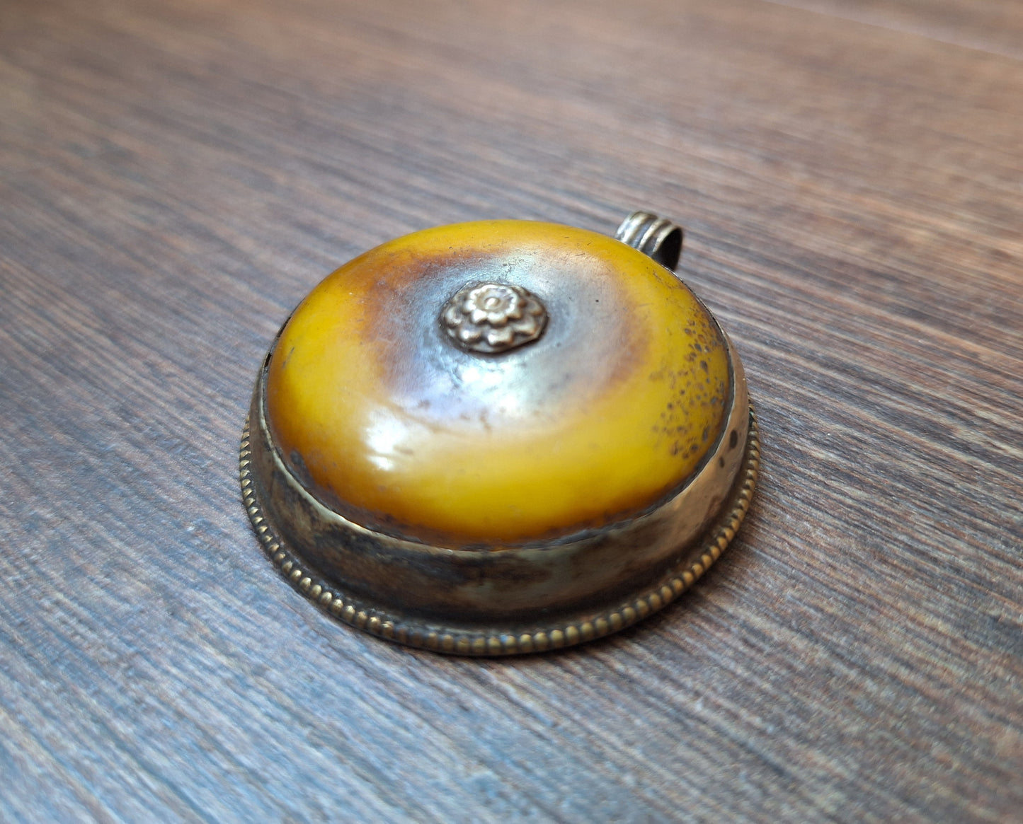 Vintage Tibetan silver and copal pendant