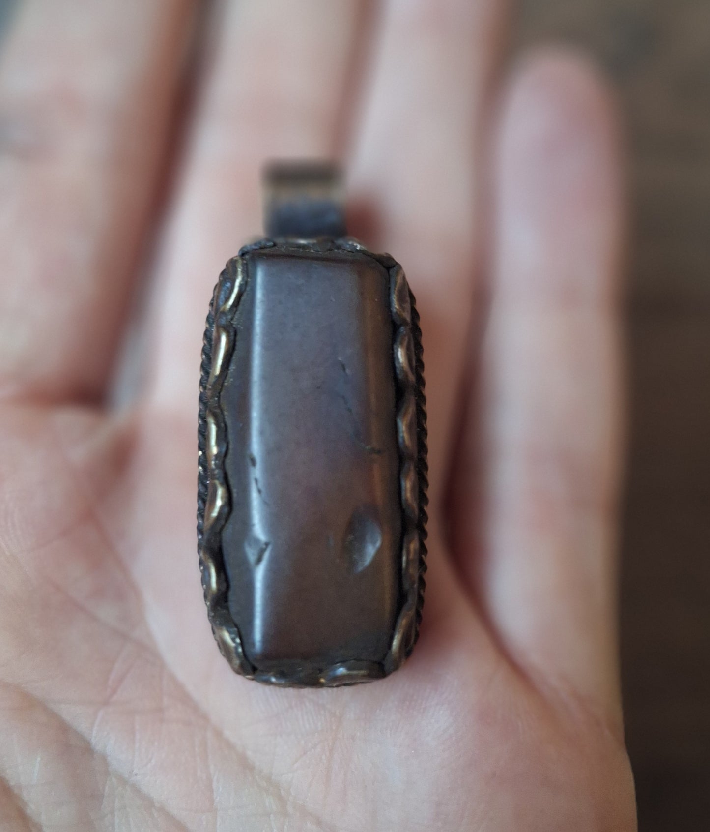 Vintage Tibetan silver and amber pendant