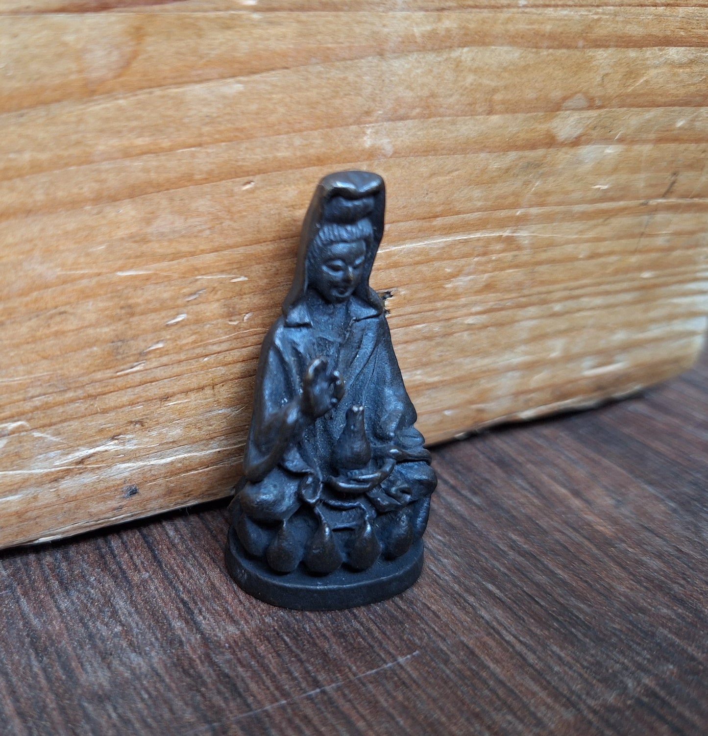 Small bronze Guanyin figurine