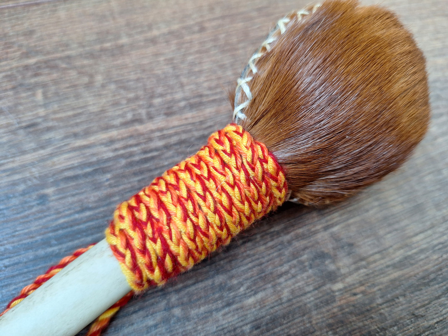 Horse hide and red deer leg bone rattle