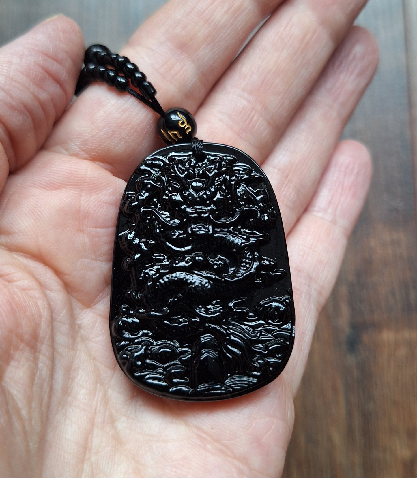 Black glass necklace with Dragon pendant