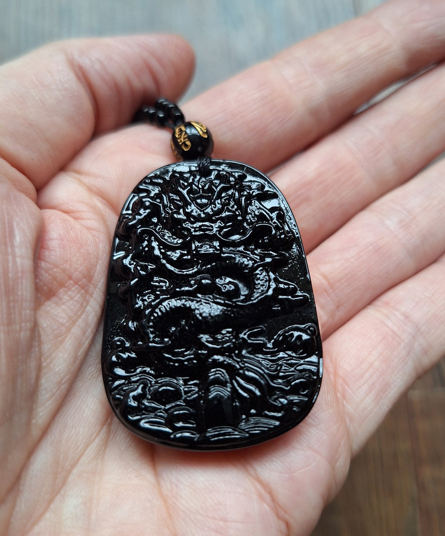 Black glass necklace with Dragon pendant