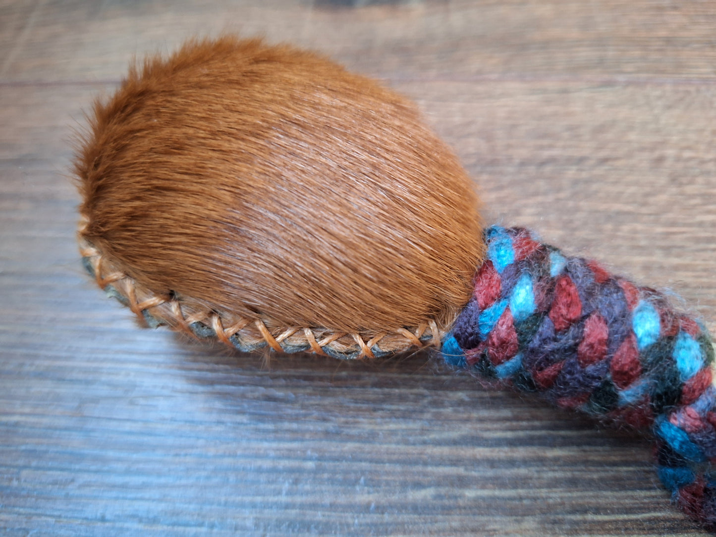 Horse hide and roe deer leg bone rattle