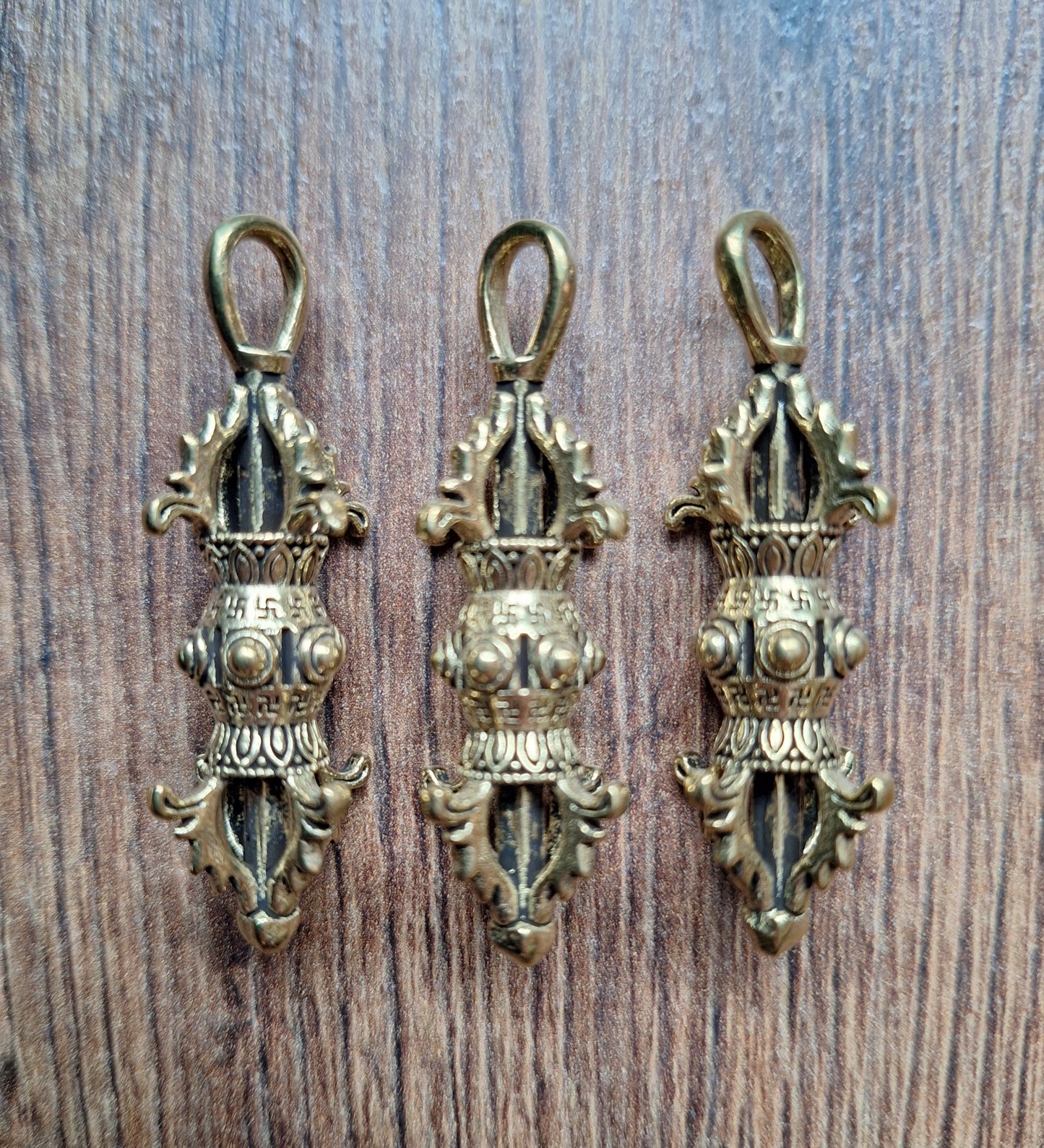 Brass dorje pendant