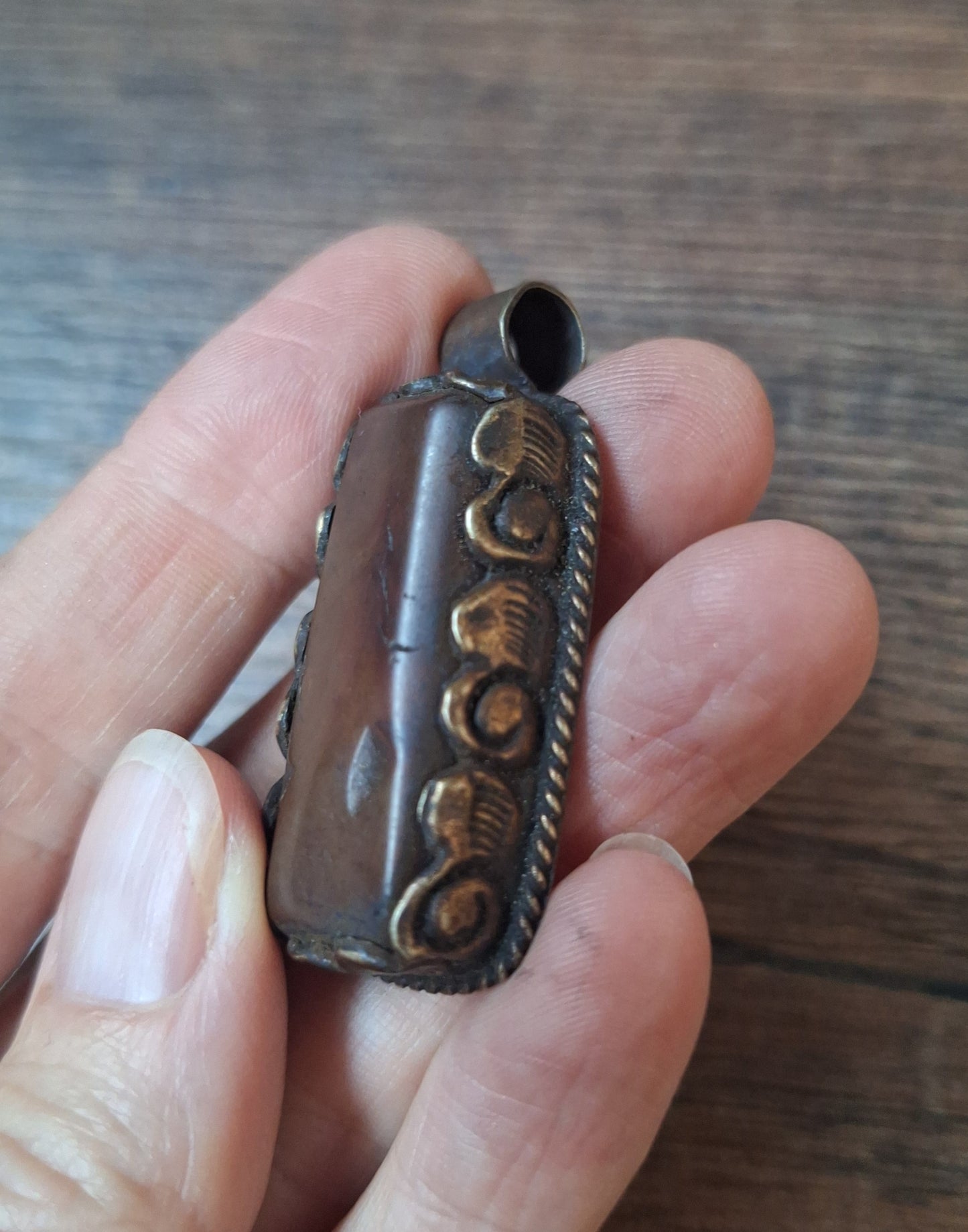 Vintage Tibetan silver and amber pendant