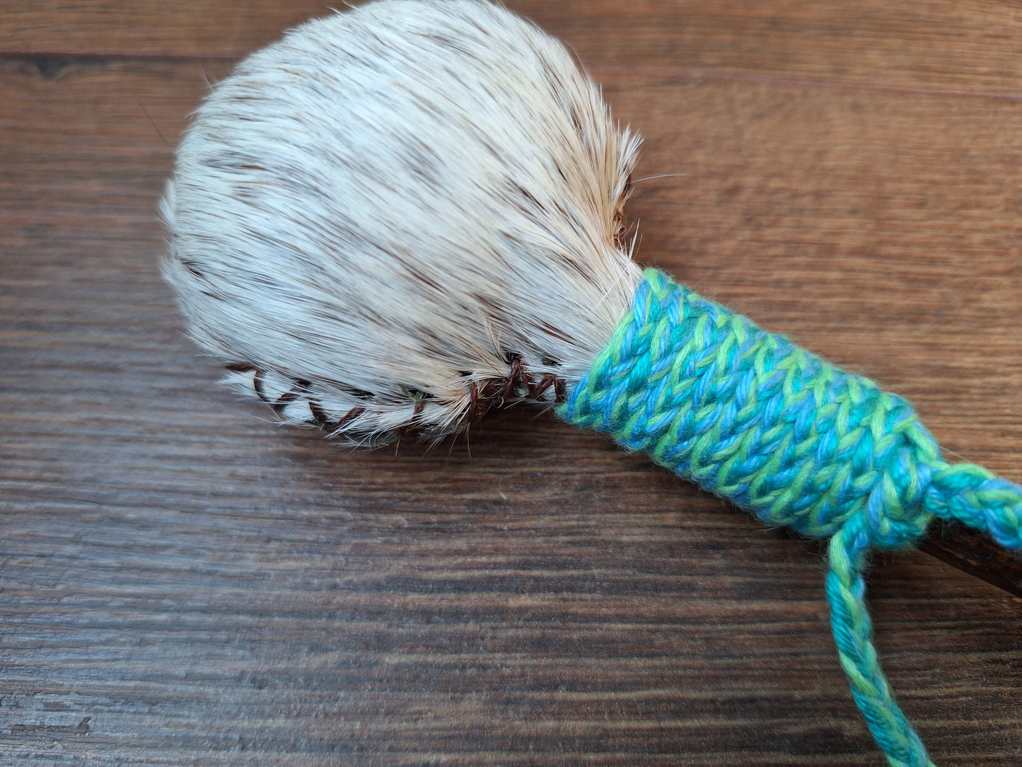 Horse hide and roe deer antler rattle