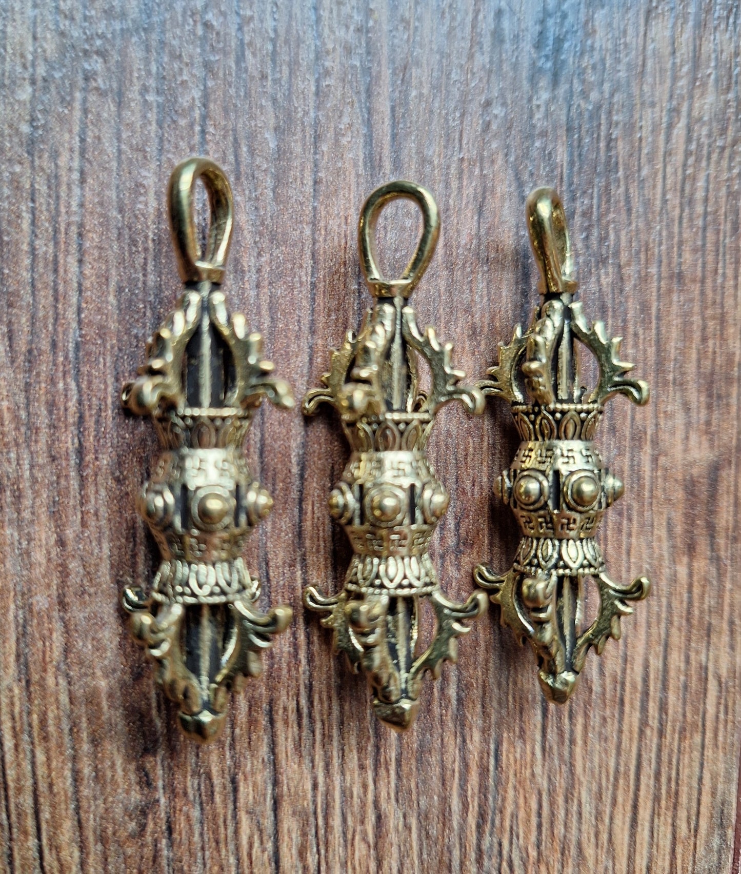 Brass dorje pendant