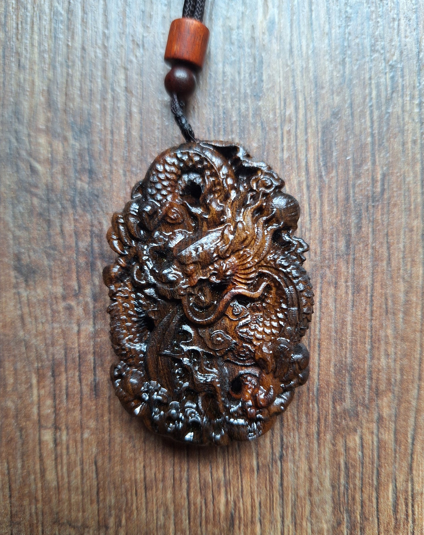 Necklace with wooden pendant Dragon