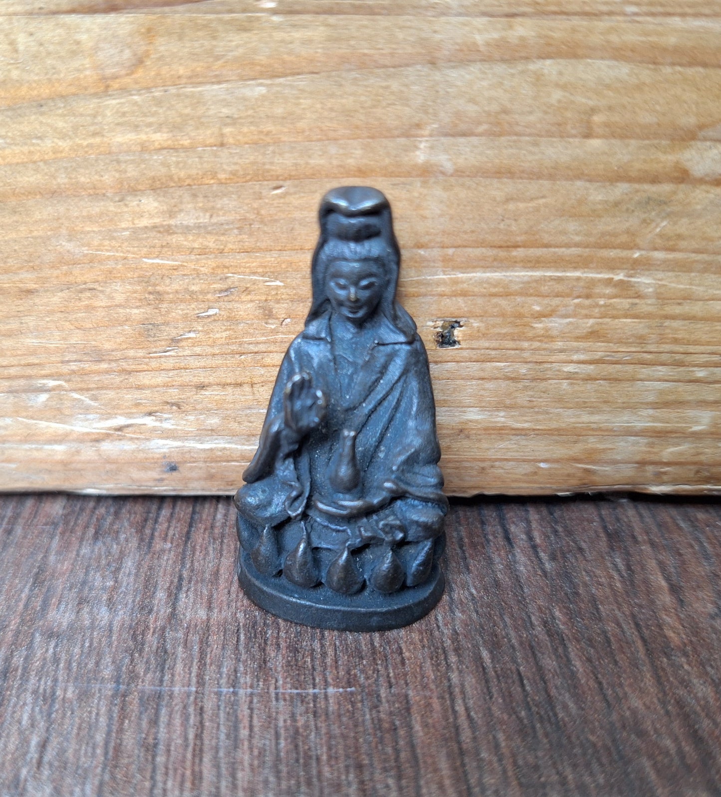 Small bronze Guanyin figurine