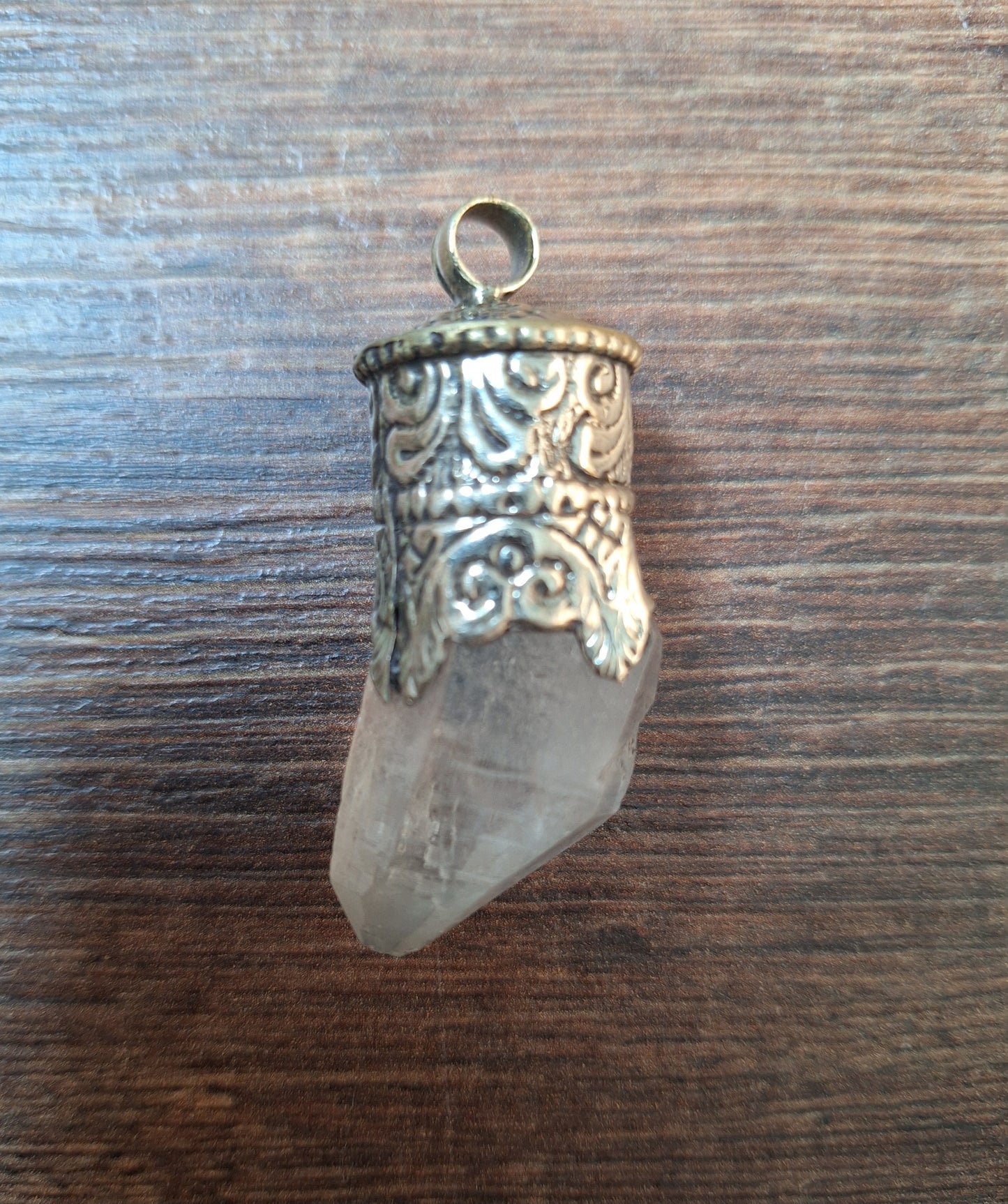 Vintage quartz crystal in Tibetan silver pendant
