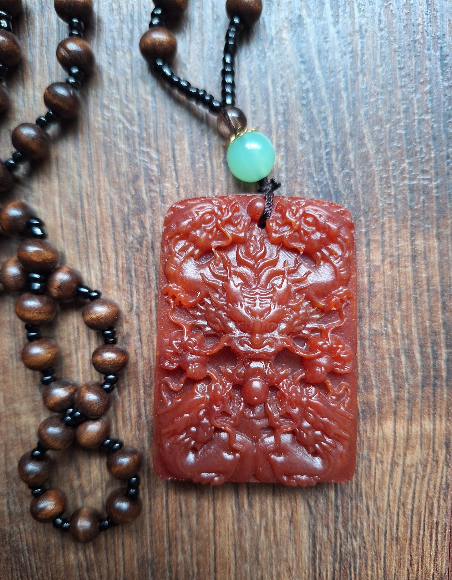 Necklace with resin dragon pendant