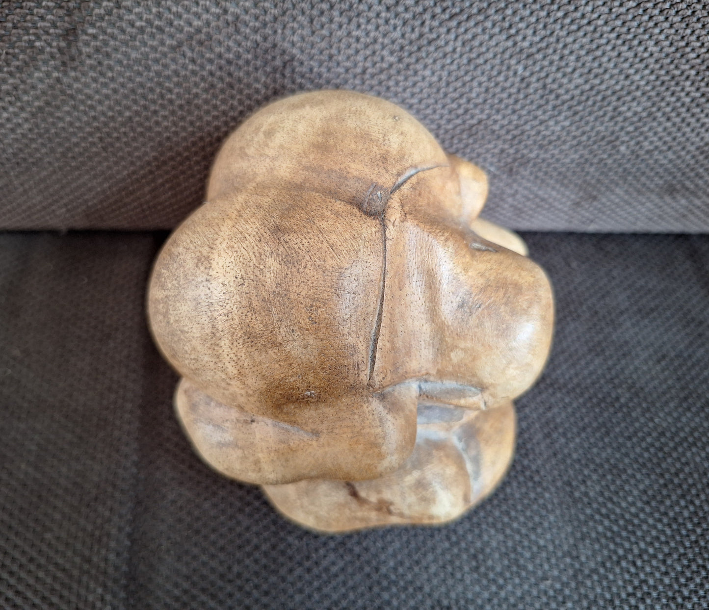 Wooden Weeping Buddha figurine