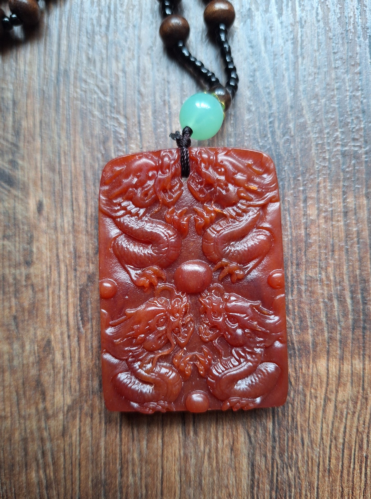 Necklace with resin dragon pendant