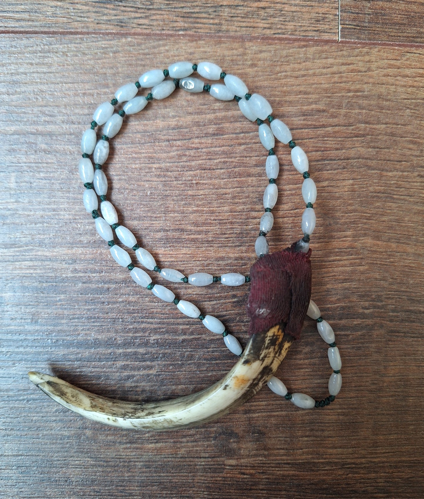 Vintage Nepalese snow quartz necklace with wild boar tooth pendant