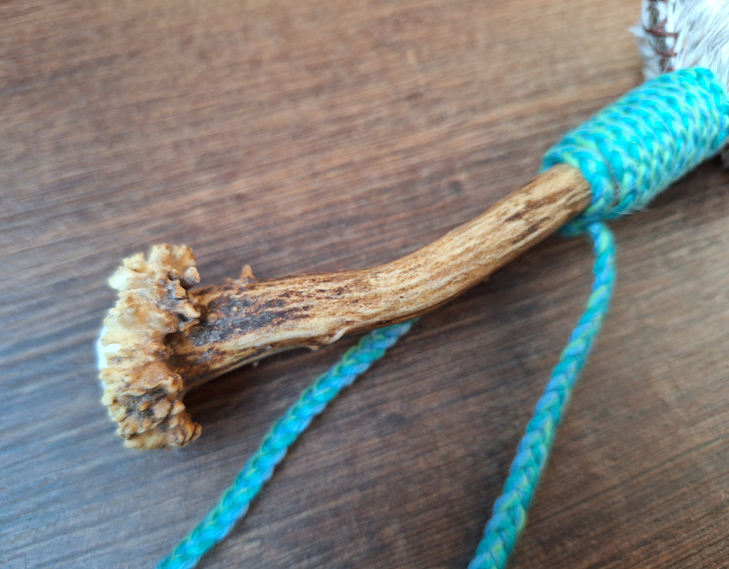 Horse hide and roe deer antler rattle