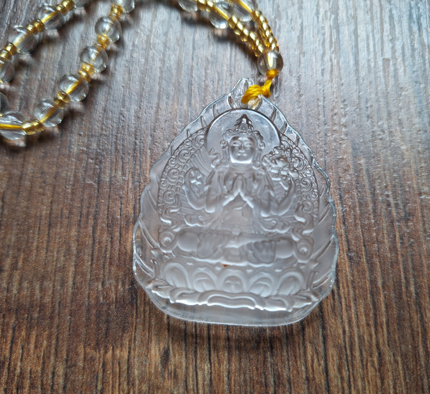 Glass necklace with Guanyin pendant