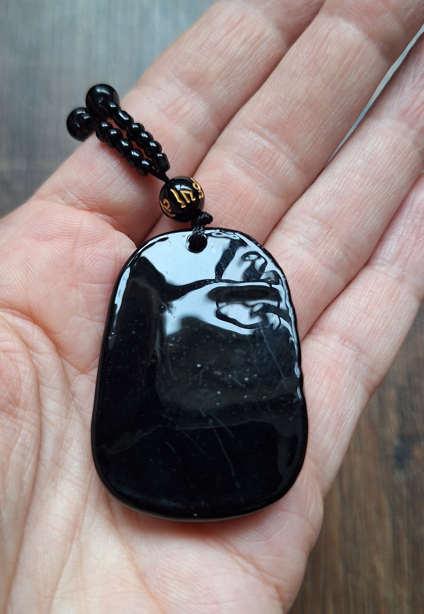 Black glass necklace with Dragon pendant