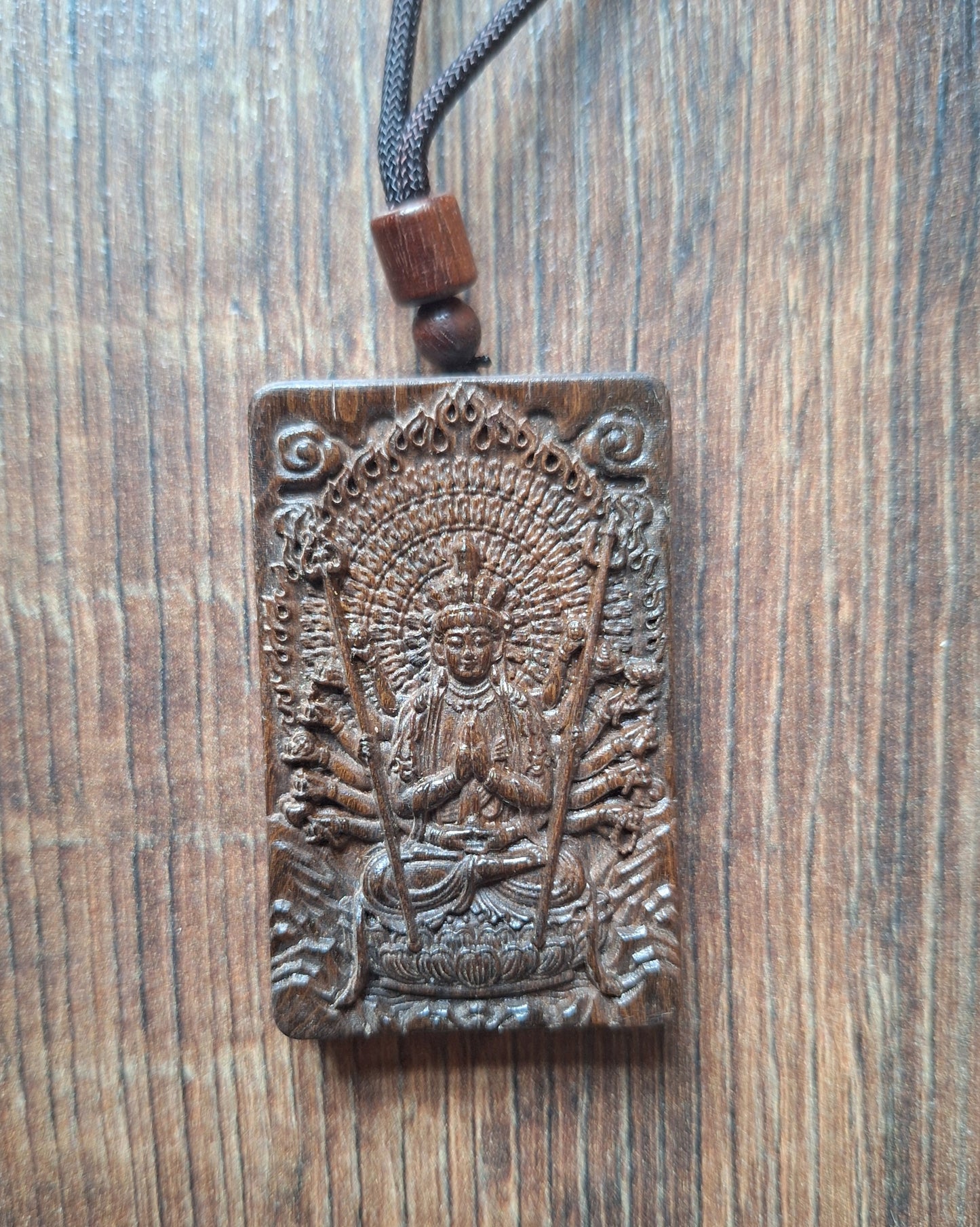 Necklace with wooden pendant Avalokiteshvara