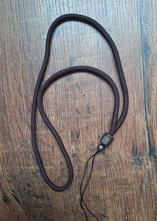 Amulet cord brown with shou symbol
