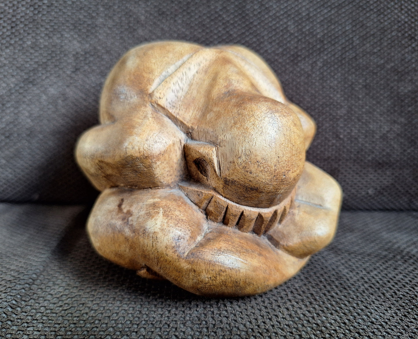 Wooden Weeping Buddha figurine