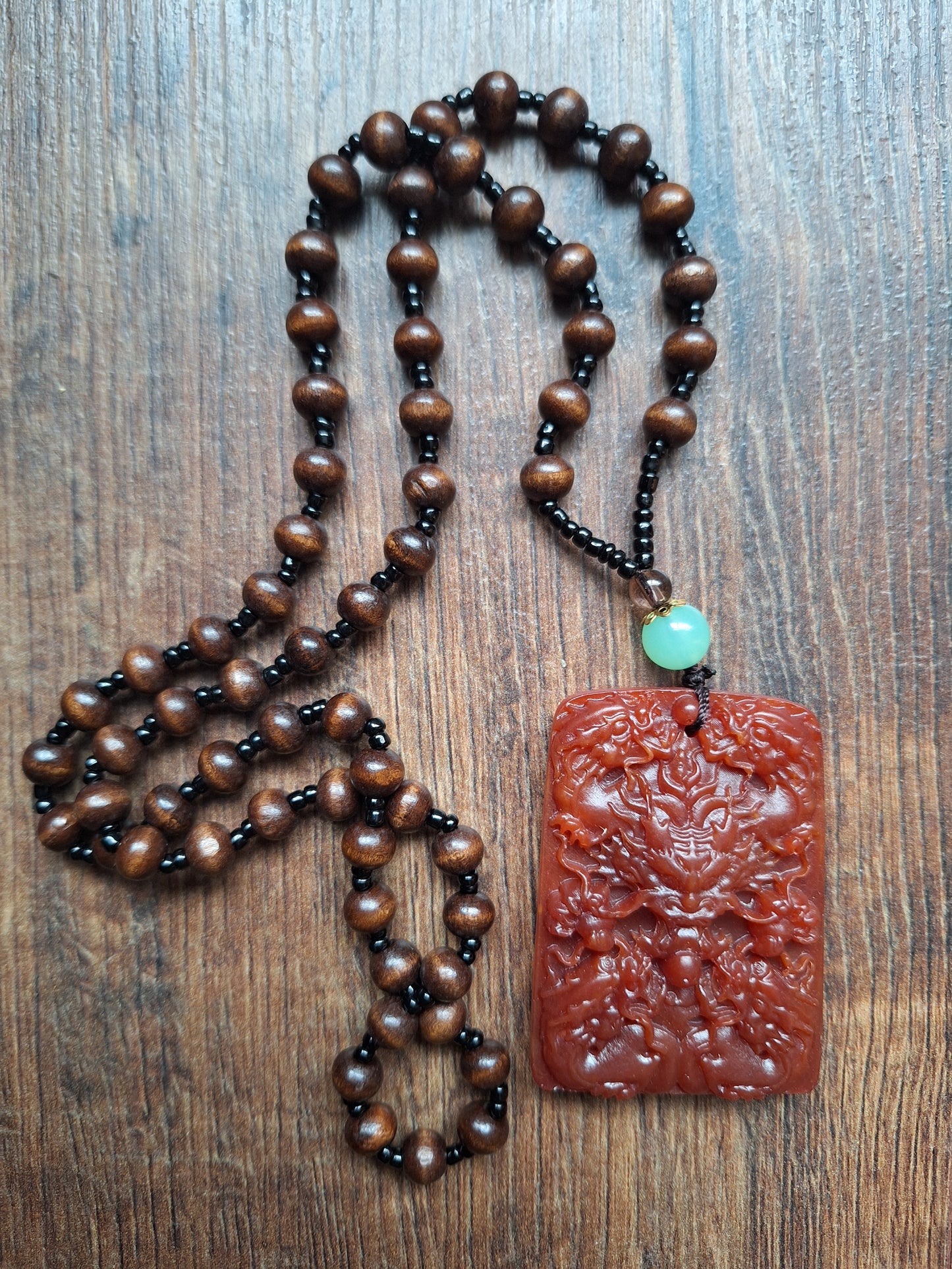 Necklace with resin dragon pendant